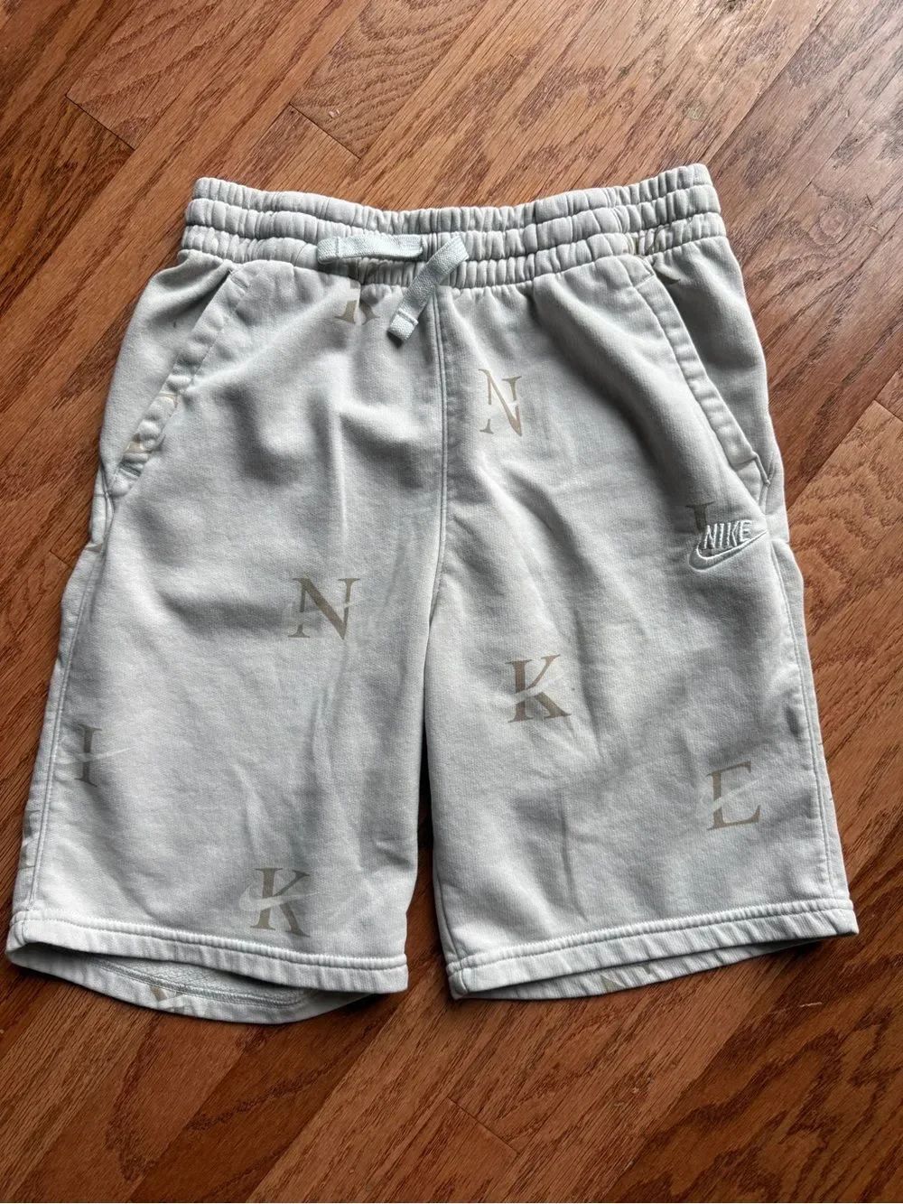 Nike boys shorts, cotton, tan with letters and checks, youth XL (14-16)